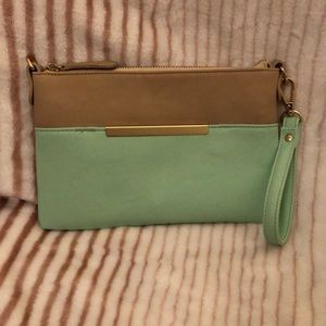 Beige, gold, and seafoam green wristlet
